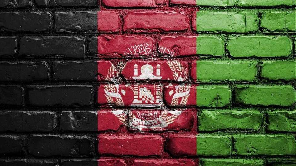 Флаг Афганистана на кирпичной стене