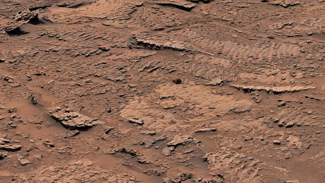 Скалы с волнистой текстурой на Марсе