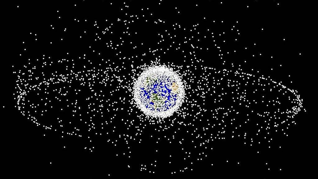 Компьютерная модель распределения космических объектов в космосе, согласно описанию NASA 95% из них являются мусором
