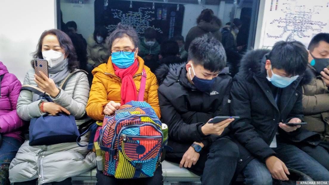 Люди в масках в Китае