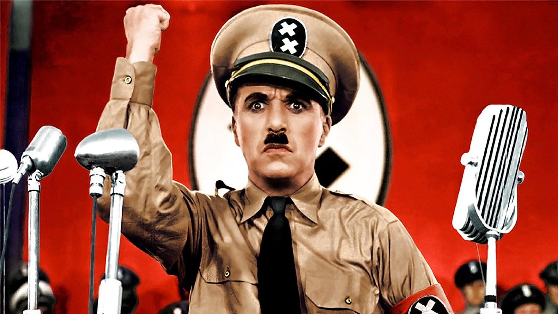 Комик Чарли Чаплин в роли Гитлера. Цитата из фильма «Великий диктатор». Режиссер Ч. Чаплин. 1940
