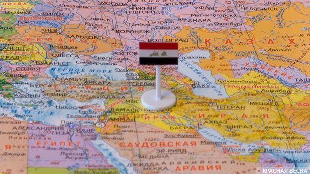 Ирак с флагом на карте мира [Татьяна Раджабова © ИА Красная Весна]