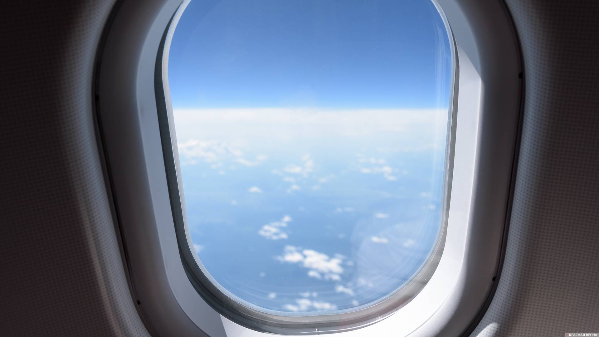 Иллюминатор в самолете