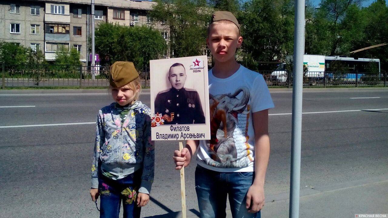 Участники Бессмертного полка в Алматы. Казахстан