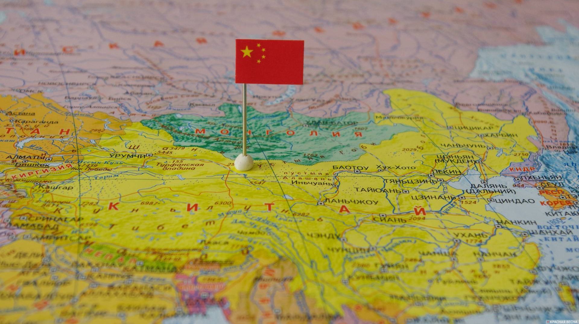 Китай с флагом на карте мира.
