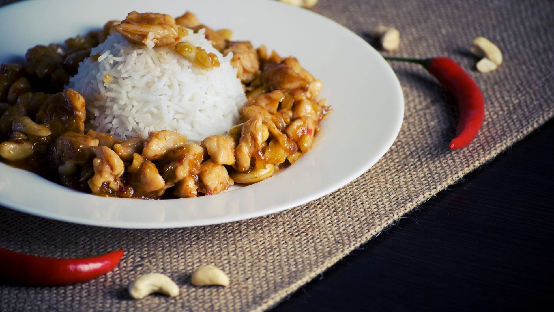 chicken, rice, cashews, chilli peppers