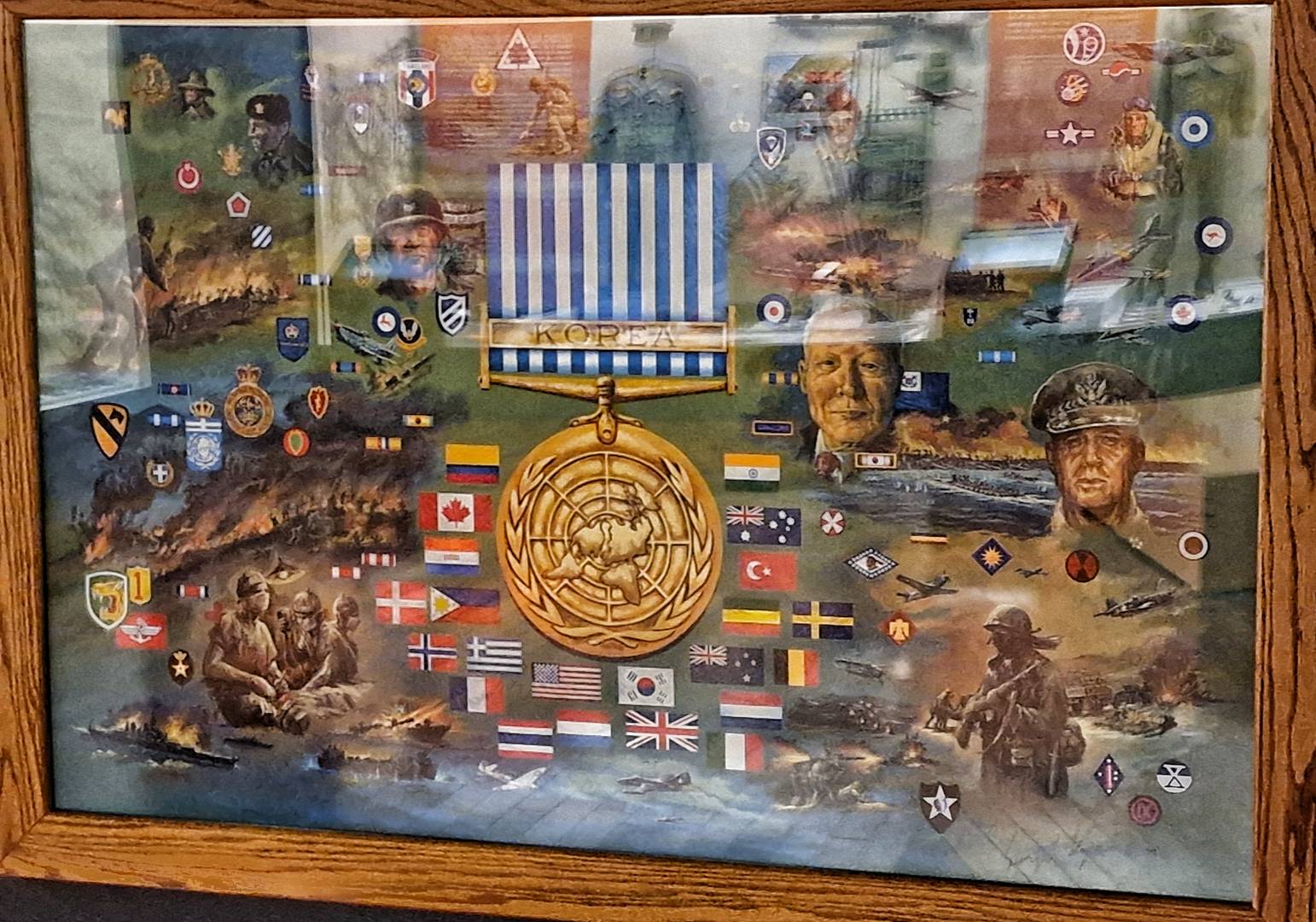 Корейская война. Плакат с участием «сил ООН» у Военного мемориала Кореи в Сеуле.