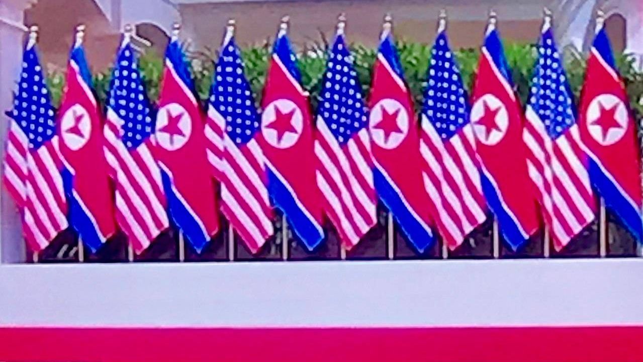 Флаги США и КНДР