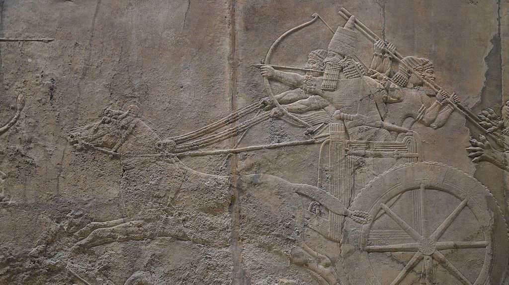 Ашшурбанапал охотится на львов. Рельеф из Северного дворца в Ниневии, ок. 645-635 годы до н. э. Британский музей